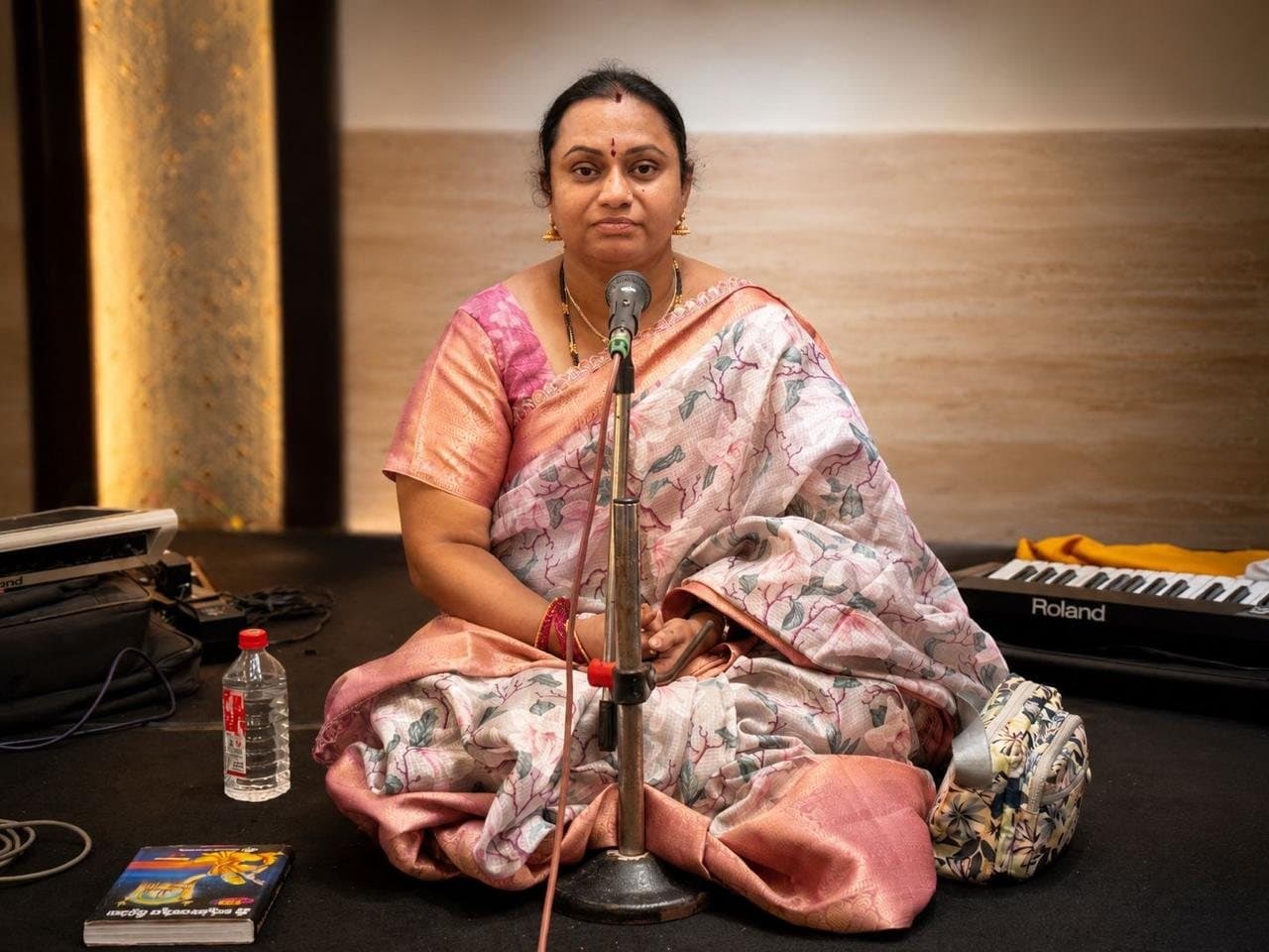 The guru at the harmonium